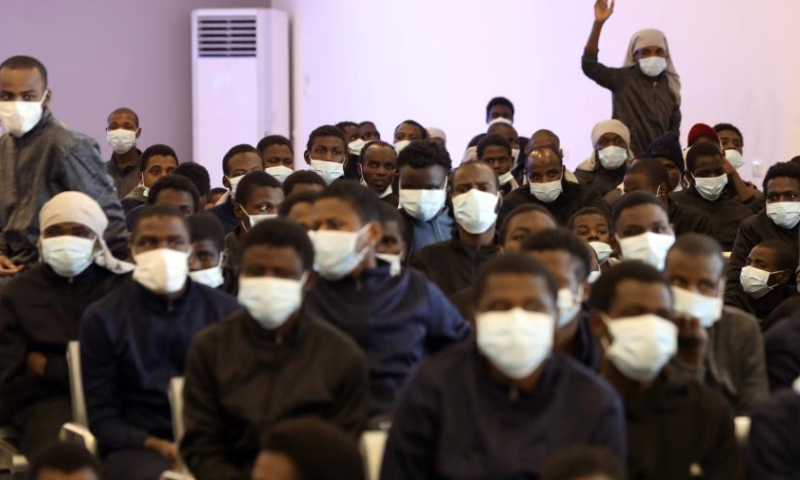 Migrants wait to be deported in Tripoli, Libya, on Dec. 25, 2024. (Photo by Hamza Turkia/Xinhua)