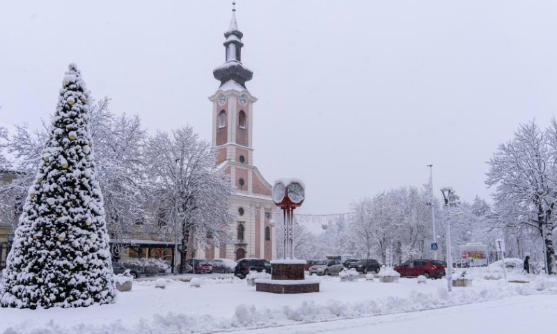 Photo taken on Dec. 23, 2024 shows a view of the snow-covered Otocac, Croatia. (Hrvoje Kostelac/PIXSELL via Xinhua)