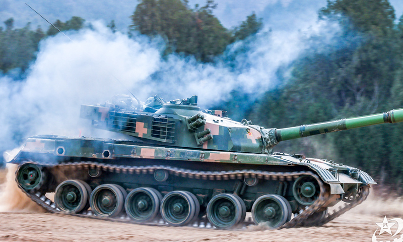 A Type 96A main battle tank (MBT) attached to a brigade under the Chinese PLA 71st Group Army rumbles through the field during a maneuver training exercise on December 11, 2024. (eng.chinamil.com.cn/Photo by Lin Min)