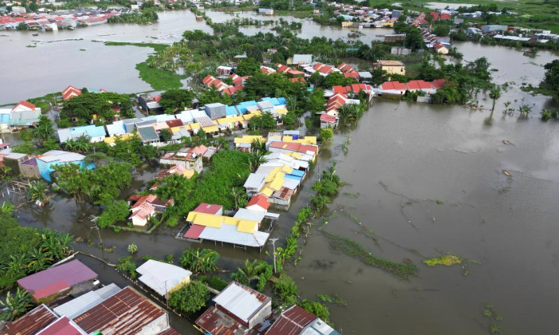 An aerial drone photo taken on Dec. 24, 2024 shows a flooded residential area after heavy rain hit Makassar, South Sulawesi Province, Indonesia. Floods and landslides have been hitting several regions in the Southeast Asian archipelago in the past week. (Photo by Niaz Sharief/Xinhua)