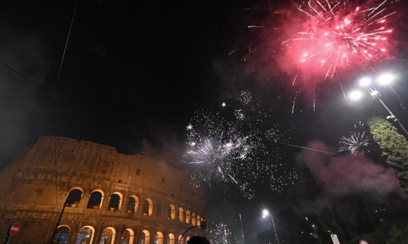 Fireworks explode over the Colosseum to celebrate the New Year in Rome, on Dec. 31, 2024. (Photo by Alberto Lingria/Xinhua)