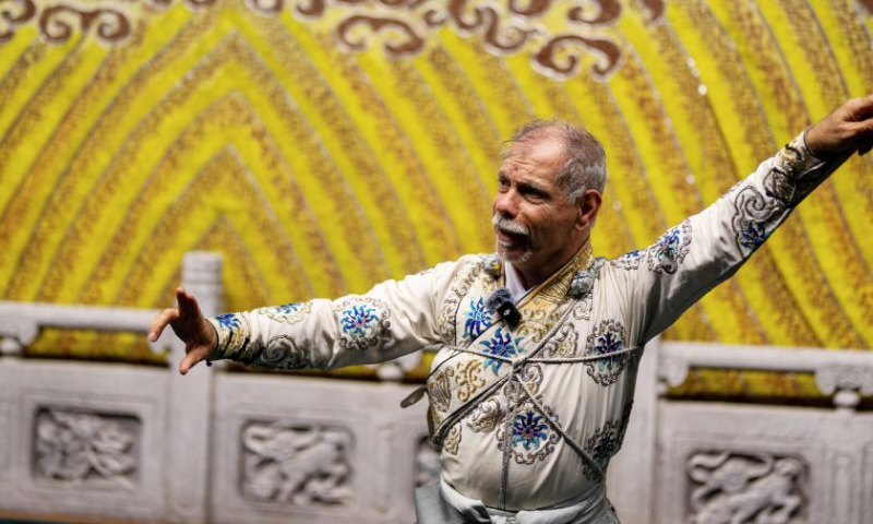 Ghaffar Pourazar performs Peking Opera in Beijing, capital of China, Sept. 30, 2024. (Xinhua/Ren Ke)