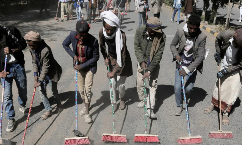 Yemeni locals participate in a comprehensive cleaning campaign launched to welcome the new year in Sanaa, Yemen, on Jan. 1, 2025. (Photo by Mohammed Mohammed/Xinhua)