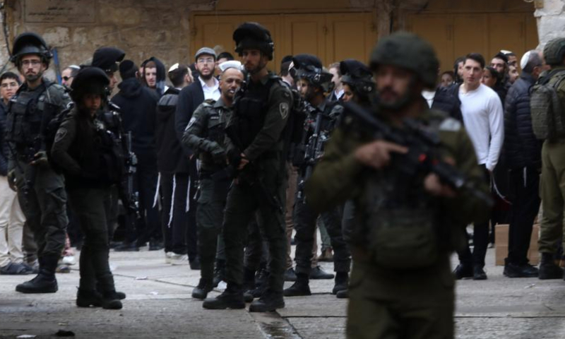 Israeli forces take security measures in the Old City of Hebron during a raid to provide protection for Jewish settlers who want to visit a historical site in Hebron, the southern West Bank, on Jan. 4, 2025. (Photo by Mamoun Wazwaz/Xinhua)