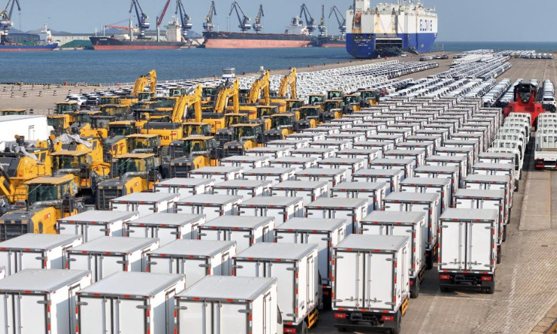 An aerial drone photo shows vehicles to be exported at Yantai Port in east China's Shandong Province, Jan. 2, 2025. China's major ports are busy at the beginning of the new year. (Photo by Tang Ke/Xinhua)