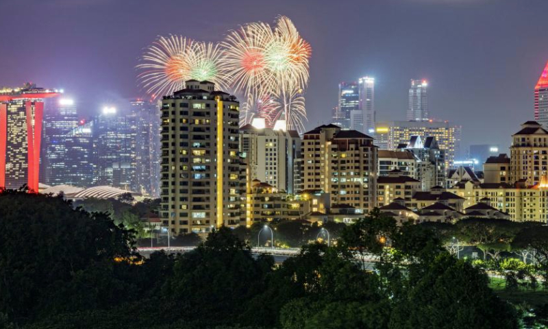 Fireworks explode over Marina Bay to celebrate the New Year in Singapore, on Jan. 1, 2025. (Photo by Then Chih Wey/Xinhua)