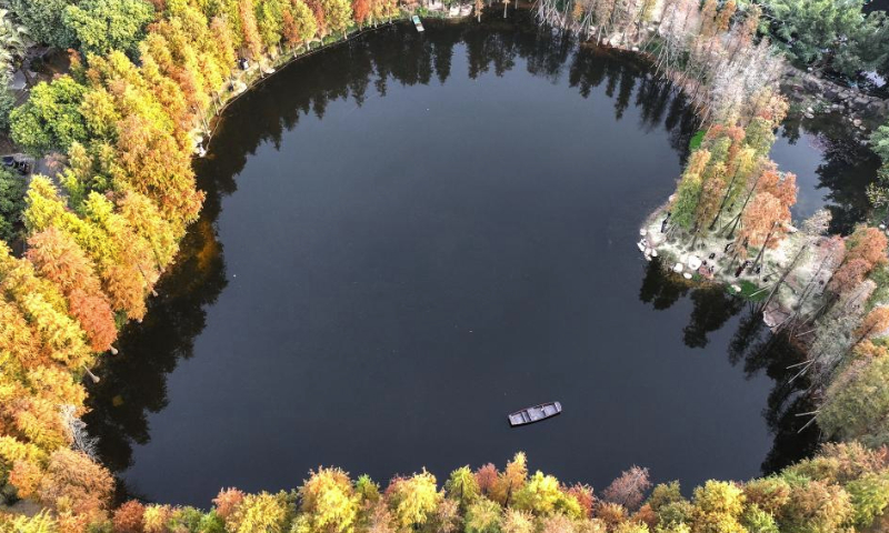 An aerial drone photo taken on Dec. 23, 2024 shows a view of Qingxiu Mountain scenic area in Nanning, south China's Guangxi Zhuang Autonomous Region. (Photo by Yu Xiangquan/Xinhua)