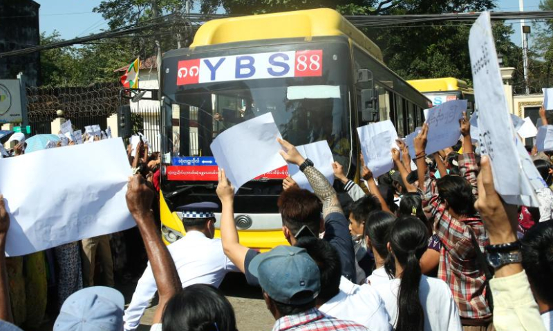 Buses carrying prisoners who have been granted pardons leave the Insein Prison in Yangon, Myanmar, Jan. 4, 2025. Myanmar's State Administration Council on Saturday pardoned approximately 6,000 prisoners to mark the country's 77th anniversary of Independence Day, according to the council's orders. (Photo by Haymhan Aung/Xinhua)