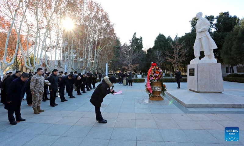 Participants bow before the tomb of Canadian surgeon Norman Bethune during a commemoration event in Shijiazhuang, north China's Hebei Province, Dec. 21, 2024. (The North China Military Martyrs Cemetery/Handout via Xinhua)