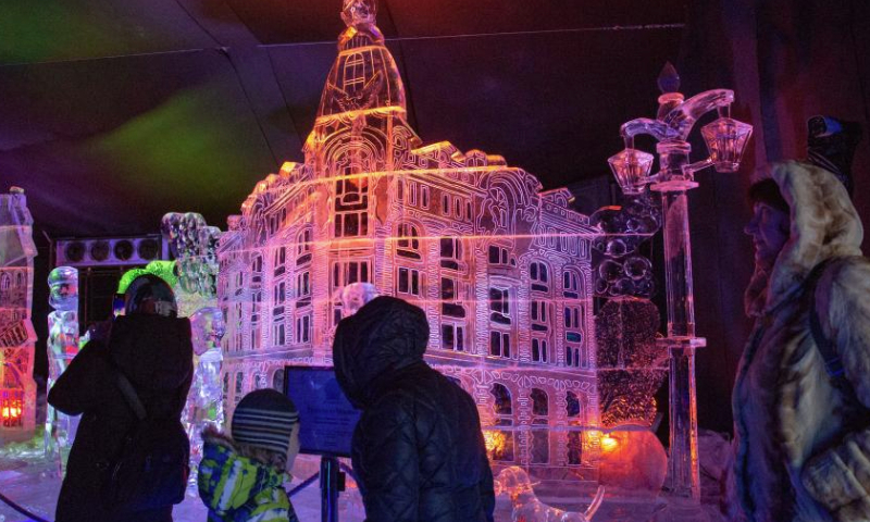 People visit an ice sculpture festival held at the Peter and Paul Fortress in St. Petersburg, Russia, Jan. 5, 2025. The event kicked off here on Jan. 1 and will be open to the public until Jan. 14. (Photo by Irina Motina/Xinhua)