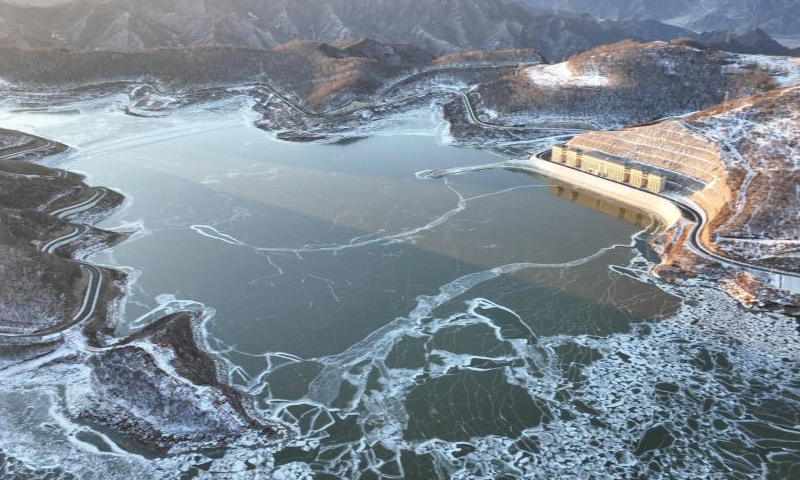 A drone photo taken on Dec. 31, 2024 shows a reservoir of Fengning pumped-storage power station in Fengning Manchu Autonomous County, north China's Hebei Province. Fengning power station, the pumped-storage power station with the largest installed capacity of its kind in the world, was put into full operation on Tuesday. (Photo by Wang Liqun/Xinhua)