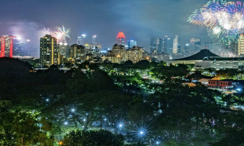 Fireworks explode over Marina Bay and Kallang Basin to celebrate the New Year in Singapore, on Jan. 1, 2025. (Photo by Then Chih Wey/Xinhua)