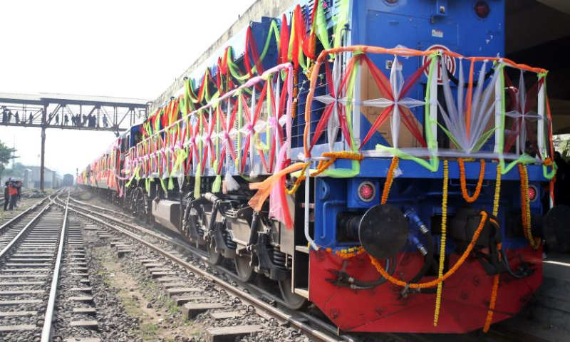 The first train of the Padma Bridge Rail Link Project (PBRLP) is pictured at Dhaka station, Dhaka, Bangladesh, Dec. 24, 2024. With the first train decorated with colorful ribbons arriving at Dhaka station, Bangladesh's largest railway Padma Bridge Rail Link Project (PBRLP) officially opened across its entire line to traffic here Tuesday.

The PBRLP, one of the significant projects under the Belt and Road Initiative (BRI) in Bangladesh, was built by the China Railway Group Limited (CREC) and funded by the Export-Import Bank of China.

The railway, known locally as the Dream Road, stretches approximately 170 km. Following its opening, travel time between the capital Dhaka and the southwestern city of Jashore will be reduced from the original 10 hours to just three hours. (Xinhua)