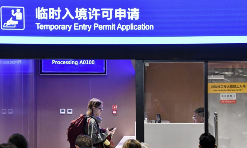 A foreign tourist applies for temporary entry permit at the checkpoint of the Beijing Daxing International Airport in Beijing, capital of China, Dec. 27, 2024. On Dec. 17, China announced a significant relaxation of its visa-free transit policy, extending the permitted stay for eligible foreign travelers from the initial 72 hours and subsequent 144 hours to 240 hours, or 10 days.

China recorded nearly 29.22 million inbound foreign visits between January and November 2024, up 86.2 percent year on year. Of these, 17.45 million entered the country visa-free, marking a significant 123.3 percent year-on-year growth. (Xinhua/Ju Huanzong)

