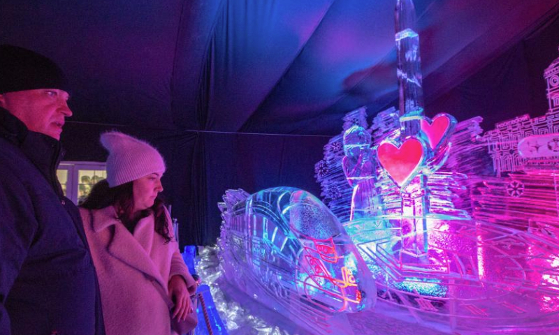 People visit an ice sculpture festival held at the Peter and Paul Fortress in St. Petersburg, Russia, Jan. 5, 2025. The event kicked off here on Jan. 1 and will be open to the public until Jan. 14. (Photo by Irina Motina/Xinhua)