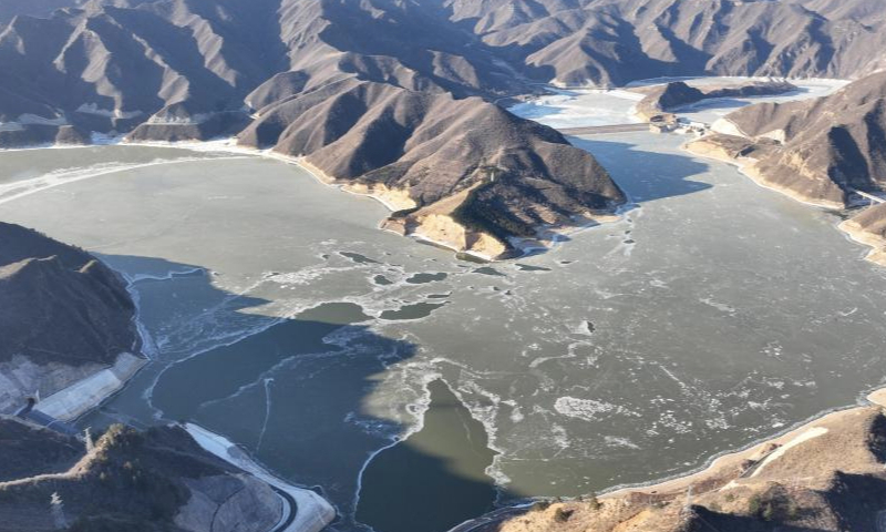 A drone photo taken on Dec. 31, 2024 shows a reservoir of Fengning pumped-storage power station in Fengning Manchu Autonomous County, north China's Hebei Province. Fengning power station, the pumped-storage power station with the largest installed capacity of its kind in the world, was put into full operation on Tuesday. (Photo by Wang Liqun/Xinhua)