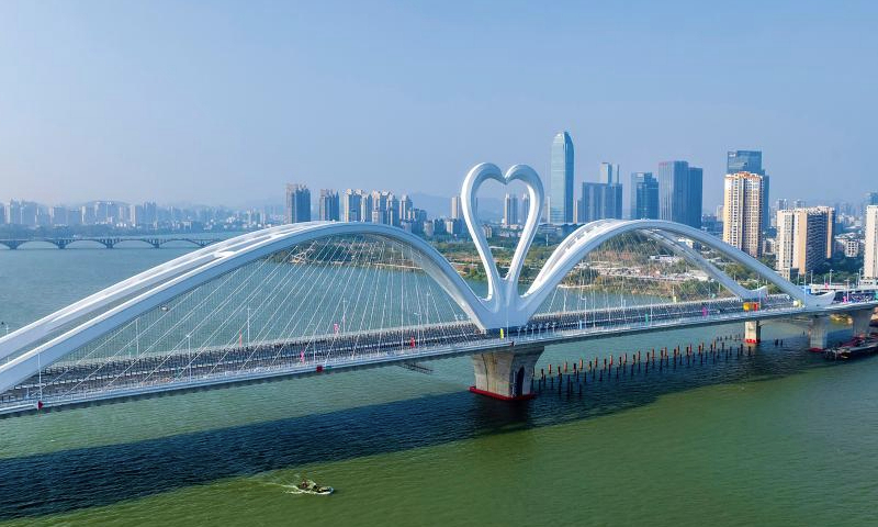 This aerial drone photo taken on Dec. 28, 2024 shows Echeng (nickname of Huizhou, meaning the city of goose) Bridge in Huizhou, south China's Guangdong Province. The 1,119.5-meter-long Echeng Bridge was put into operation on Saturday. (Xinhua/Tian Jianchuan)