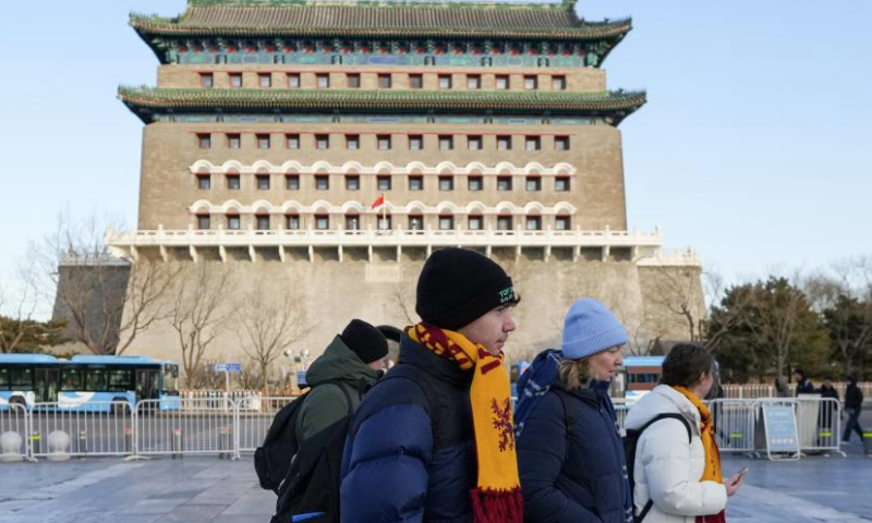 Foreign tourists visit Qianmen Street in Beijing, capital of China, Dec. 26, 2024. On Dec. 17, China announced a significant relaxation of its visa-free transit policy, extending the permitted stay for eligible foreign travelers from the initial 72 hours and subsequent 144 hours to 240 hours, or 10 days.

China recorded nearly 29.22 million inbound foreign visits between January and November 2024, up 86.2 percent year on year. Of these, 17.45 million entered the country visa-free, marking a significant 123.3 percent year-on-year growth. (Xinhua/Ju Huanzong)