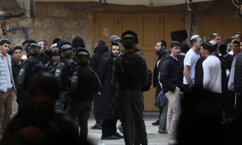 Israeli forces take security measures in the Old City of Hebron during a raid to provide protection for Jewish settlers who want to visit a historical site in Hebron, the southern West Bank, on Jan. 4, 2025. (Photo by Mamoun Wazwaz/Xinhua)