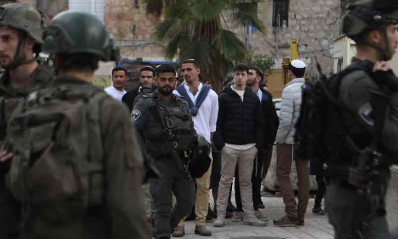 Israeli forces take security measures in the Old City of Hebron during a raid to provide protection for Jewish settlers who want to visit a historical site in Hebron, the southern West Bank, on Jan. 4, 2025. (Photo by Mamoun Wazwaz/Xinhua)