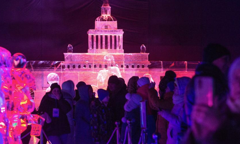 People visit an ice sculpture festival held at the Peter and Paul Fortress in St. Petersburg, Russia, Jan. 5, 2025. The event kicked off here on Jan. 1 and will be open to the public until Jan. 14. (Photo by Irina Motina/Xinhua)