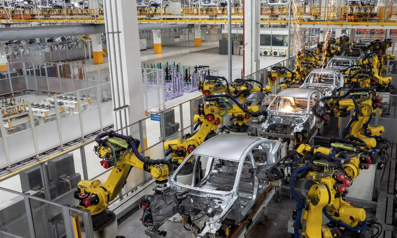 This photo taken on March 21, 2024 shows a production line of BYD, China's leading new energy vehicle (NEV) manufacturer, in Changsha, central China's Hunan Province. (Xinhua/Chen Sihan)