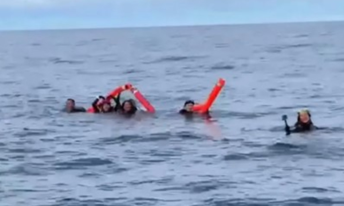 The nine individuals were discovered by a rescue boat after floating for 27 hours while diving in Palau on December 26. Photo: CCTV News