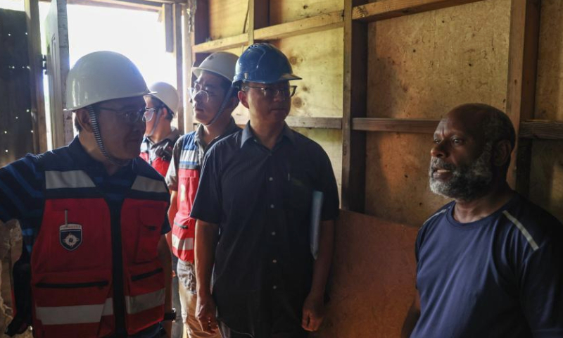 Chinese experts talk with a local resident in Port Vila, Vanuatu, Jan. 1, 2025.

At the request of the Vanuatu government, China has sent four experts to assist with post-earthquake response in the Pacific island country, Chinese foreign ministry spokesperson Mao Ning said Monday.

The four engineering experts from the China Earthquake Administration arrived in Port Vila, capital of Vanuatu, on Monday to carry out structural research, safety assessment and secondary disaster investigation in the hardest hit areas. (Xinhua/Long Lei)