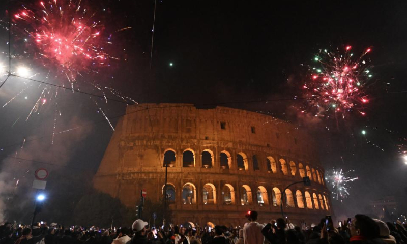 Fireworks explode over the Colosseum to celebrate the New Year in Rome, on Dec. 31, 2024. (Photo by Alberto Lingria/Xinhua)