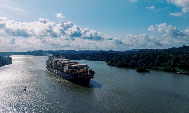 A drone photo shows a cargo vessel sailing on the Panama Canal near Panama City, Panama, Aug. 28, 2024. (Xinhua/Li Muzi)