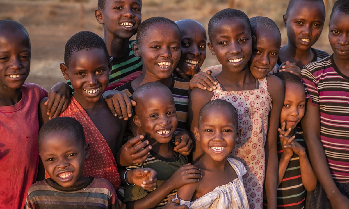 Picture shows a group of smiling children in Kenya. Photo: VCG