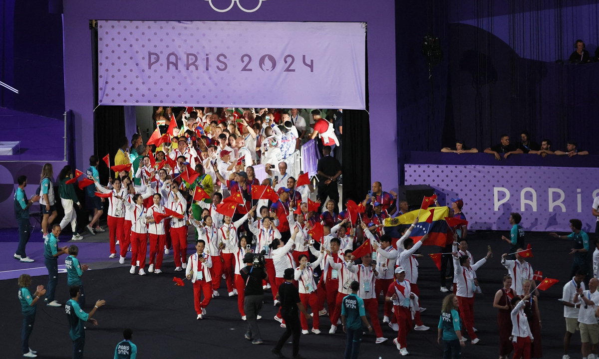 Chinese delegation entering the stadium at the closing ceremony of the Paris 2024 Olympics. Photos on this page: IC 