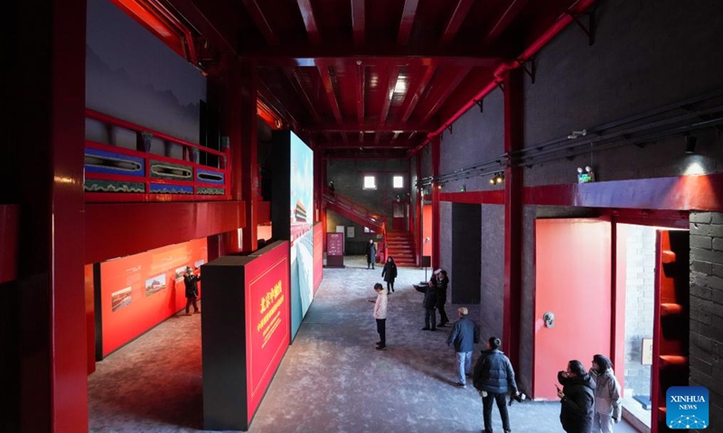 People visit an exhibition inside the Zhengyangmen Archery Tower in Beijing, capital of China, Dec. 26, 2024.