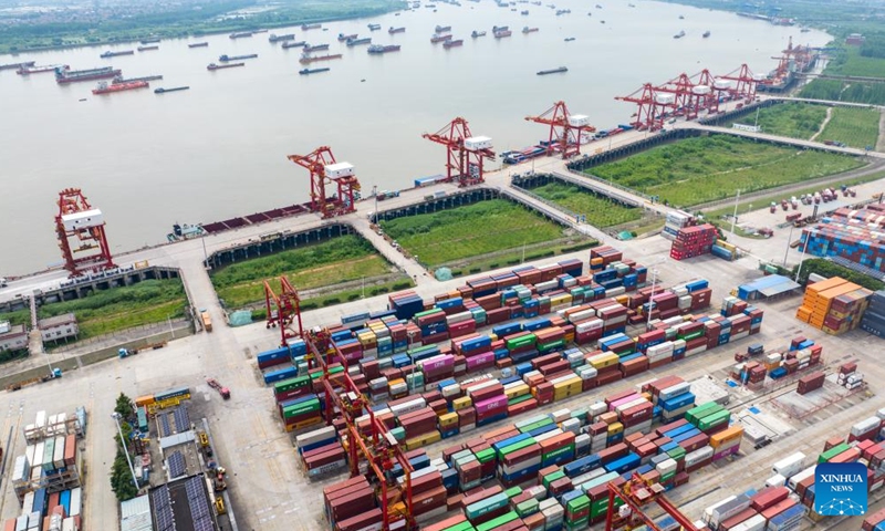 An aerial drone photo take on June 1, 2024 shows a view of the Yangluo Port in Wuhan, central China's Hubei Province. Major ports on the Yangtze, China's longest river, are expected to post a total throughput of 4.02 billion tonnes of cargo this year, breaking the mark of 4 billion tonnes for the first time, according to navigation authorities. (Xinhua/Du Zixuan)