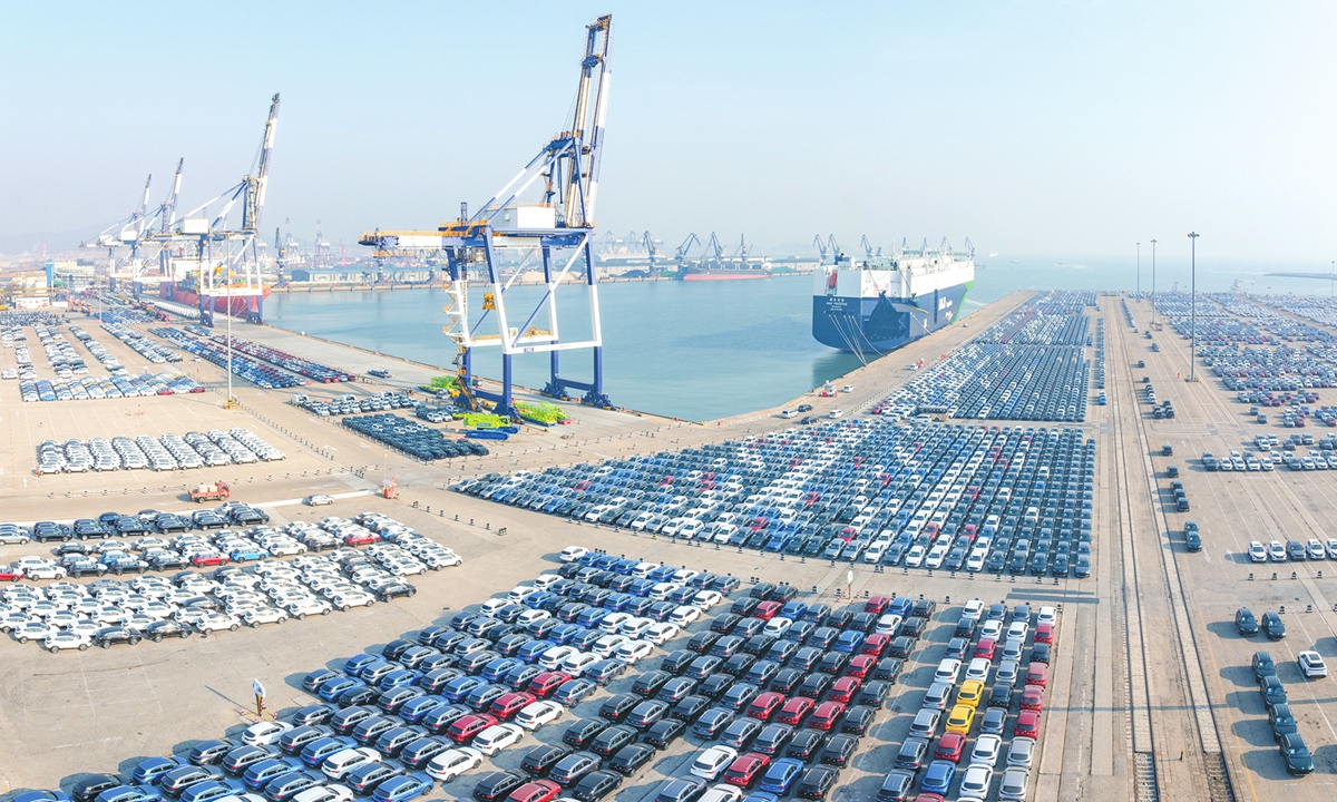 A large number of new energy vehicles at the Yantai Port in East China's Shandong Province wait to be loaded onto ships for export on December 25, 2024. Photo: VCG