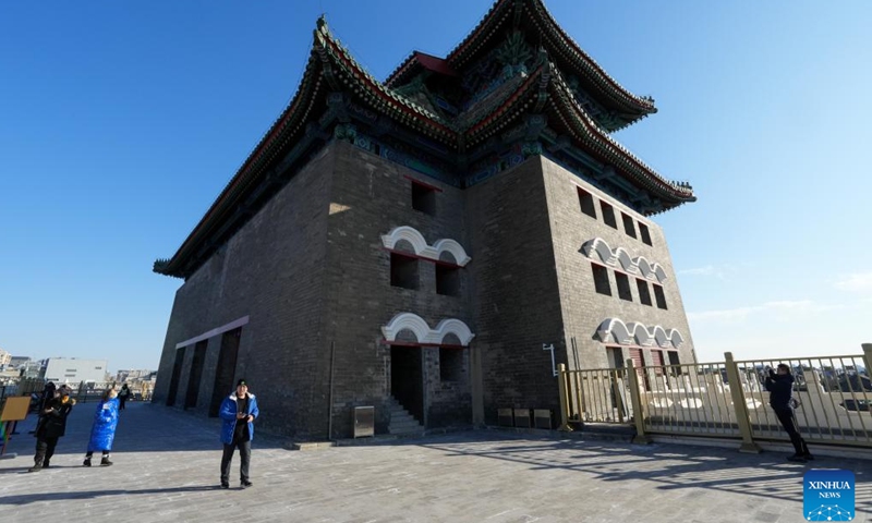 People visit the Zhengyangmen Archery Tower in Beijing, capital of China, Dec. 26, 2024. (Xinhua/Ju Huanzong)