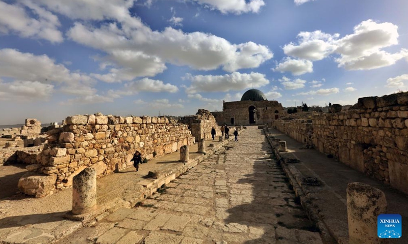 Tourists visit the Citadel archaeological site in Amman, capital of Jordan, Dec. 27, 2024. (Photo by Mohammad Abu Ghosh/Xinhua)