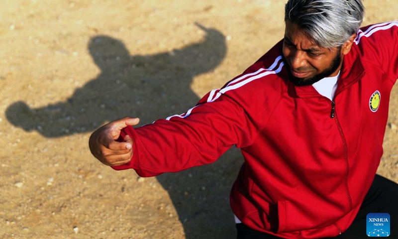 Mohammad Ullah practices drunken fist at Shaolin Epo Martial Arts School in Dengfeng, central China's Henan Province, Oct. 29, 2024. (Xinhua/Li Jianan)