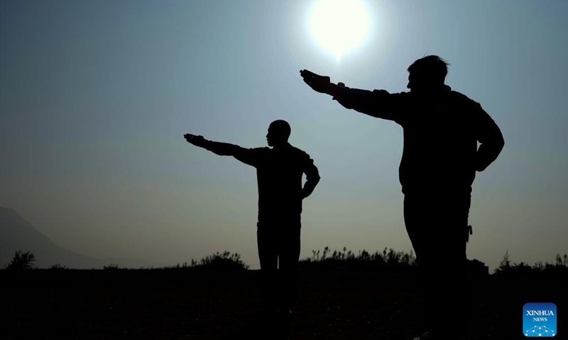 Mohammad Ullah (front) practices xiaohongquan boxing at Shaolin Epo Martial Arts School in Dengfeng, central China's Henan Province, Oct. 29, 2024. (Xinhua/Li Jianan)