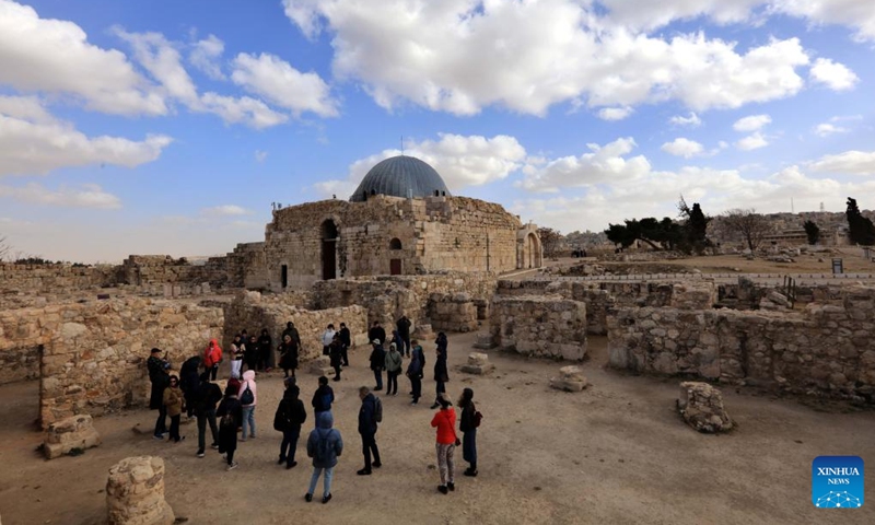 Tourists visit the Citadel archaeological site in Amman, capital of Jordan, Dec. 27, 2024. (Photo by Mohammad Abu Ghosh/Xinhua)