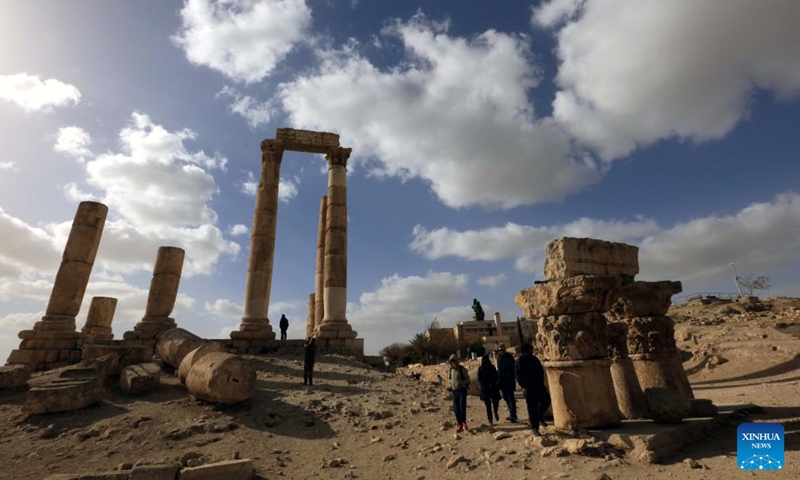 Tourists visit the Citadel archaeological site in Amman, capital of Jordan, Dec. 27, 2024. (Photo by Mohammad Abu Ghosh/Xinhua)