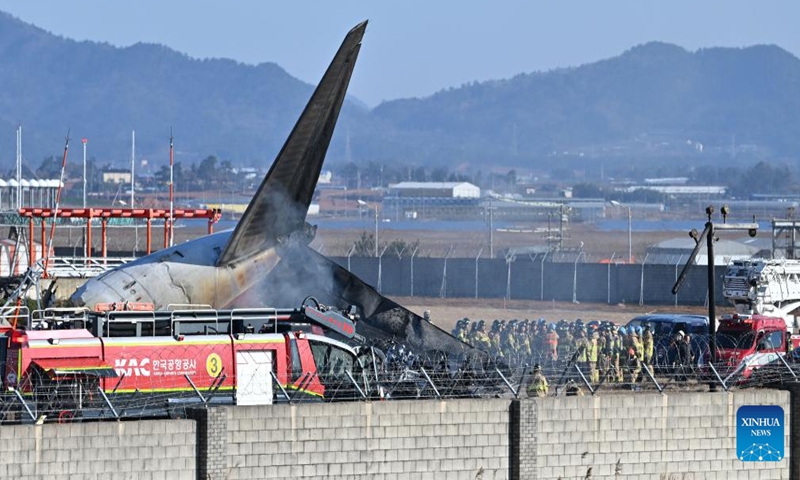 This photo shows the site of an airplane crash at an airport in Muan, southwest South Korea, on Dec. 29, 2024. All the 181 people aboard a South Korean airplane that crashed on Sunday at the country's southwestern airport were believed to have been killed except two rescued, multiple media outlets said citing the fire authorities. (NEWSIS via Xinhua)