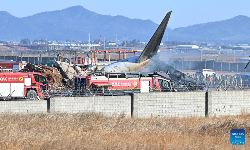 This photo shows the site of an airplane crash at an airport in Muan, southwest South Korea, on Dec. 29, 2024. All the 181 people aboard a South Korean airplane that crashed on Sunday at the country's southwestern airport were believed to have been killed except two rescued, multiple media outlets said citing the fire authorities. (NEWSIS via Xinhua)