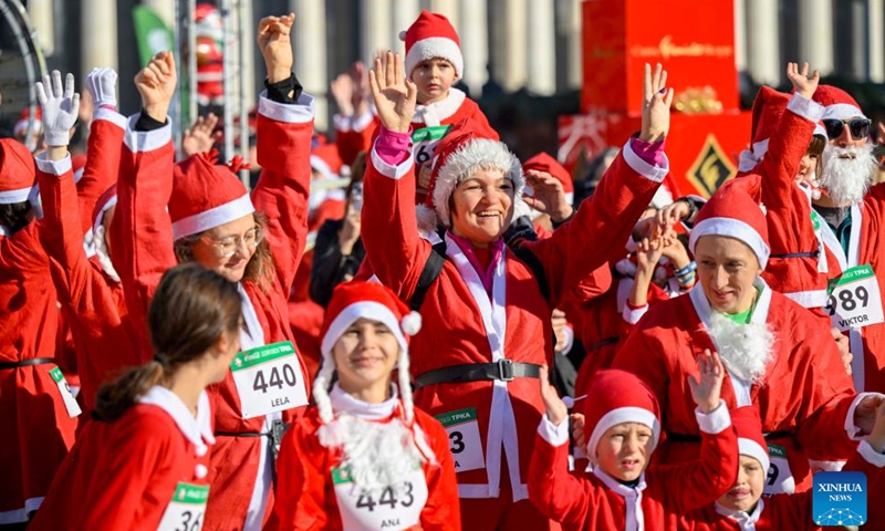 People dressed as Santa Clauses are pictured during the traditional Santa race in Skopje, North Macedonia, Dec. 29, 2024. (Photo by Tomislav Georgiev/Xinhua)