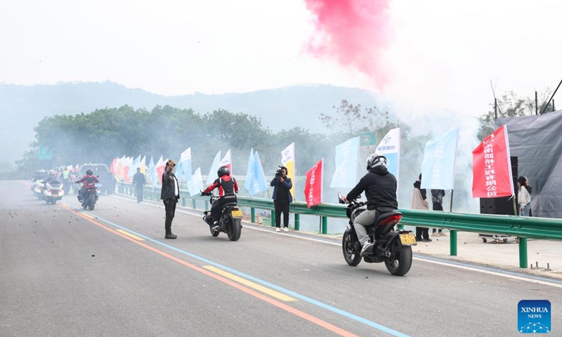 The opening ceremony for a ring road surrounding the national tropical rain forest park is held in Qiongzhong, south China's Hainan Province on Dec. 29, 2024.