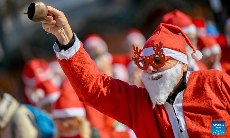 People dressed as Santa Clauses are pictured during the traditional Santa race in Skopje, North Macedonia, Dec. 29, 2024. (Photo by Tomislav Georgiev/Xinhua)