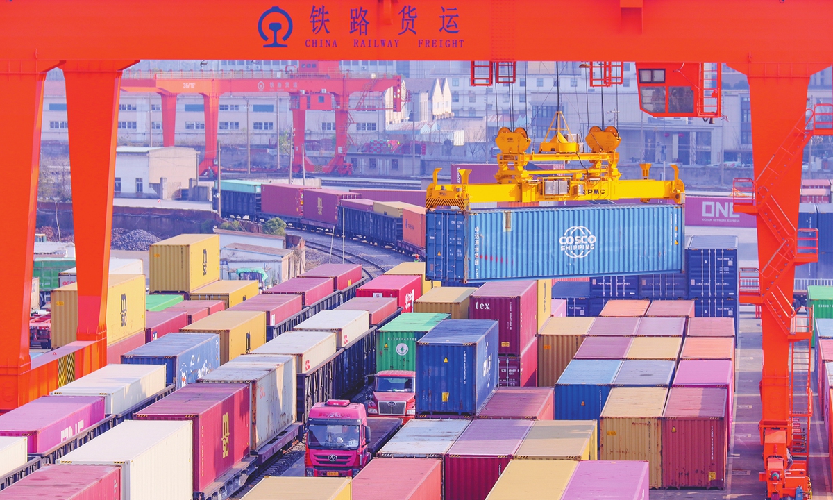 A crane handles a container at a railway freight yard at Changzhou, East China's Jiangsu Province, on January 2, 2025. China's railway transport sector facilitated a total cargo volume of 3.99 billion tons, an increase of 1.9 percent year-on-year, achieving growth for eight consecutive years. Photo: VCG