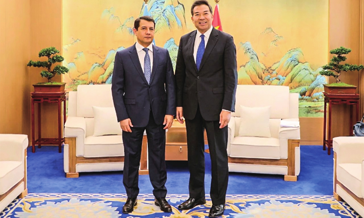 Uzbek Ambassador to China Farhod Arziev (left) meets Luo Zhaohui, chairman of the China International Development Cooperation Agency (CIDCA) in Beijing, on December 27, 2024. Photo: cidca.gov.cn