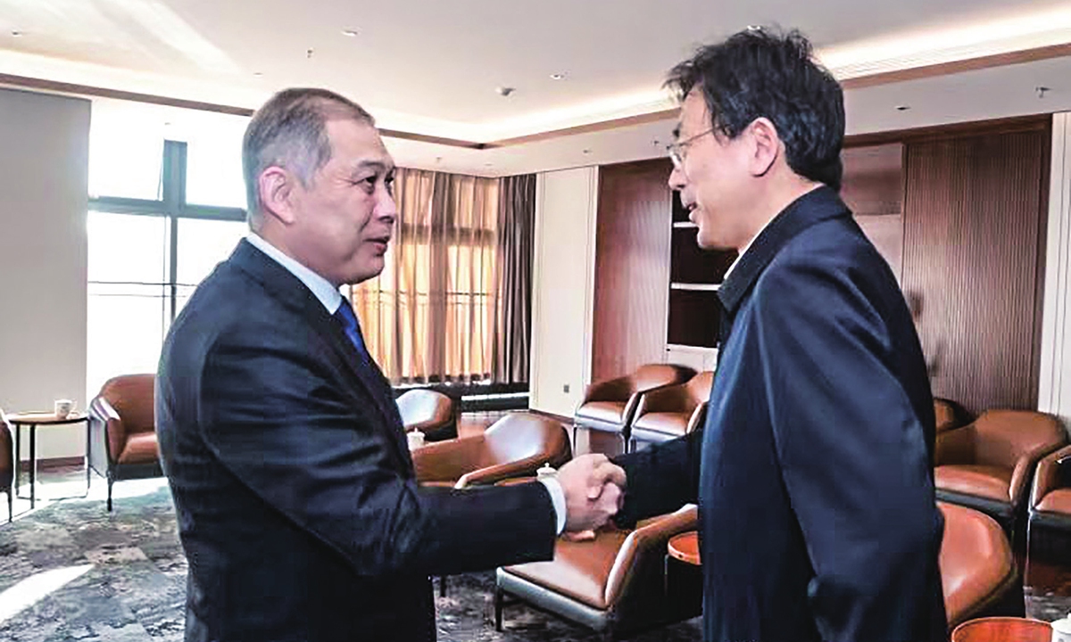 Shakhrat Nuryshev, ambassador of Kazakhstan to China (left) meets with Li Luming, president of Tsinghua University in Beijing, on December 26, 2024. Photo: Courtesy of the Embassy of Kazakhstan in China