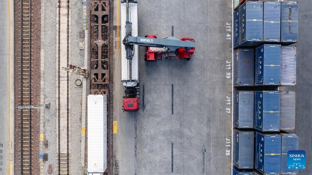 An international cargo train of China-Laos Railway is pictured at Wangjiaying West Station in Kunming, southwest China's Yunnan Province, on Jan. 2, 2025. Since the full operation of the China-Laos Railway on Dec. 3, 2021, the total cargo throughput of the railway has exceeded 50 million tons, including 11.58 million tons of cross-border goods. (Xinhua/Hu Chao)